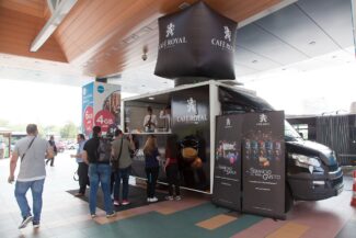 Cafe Royal sampling truck at Portico de Castellana rental space for street marketing in Madrid